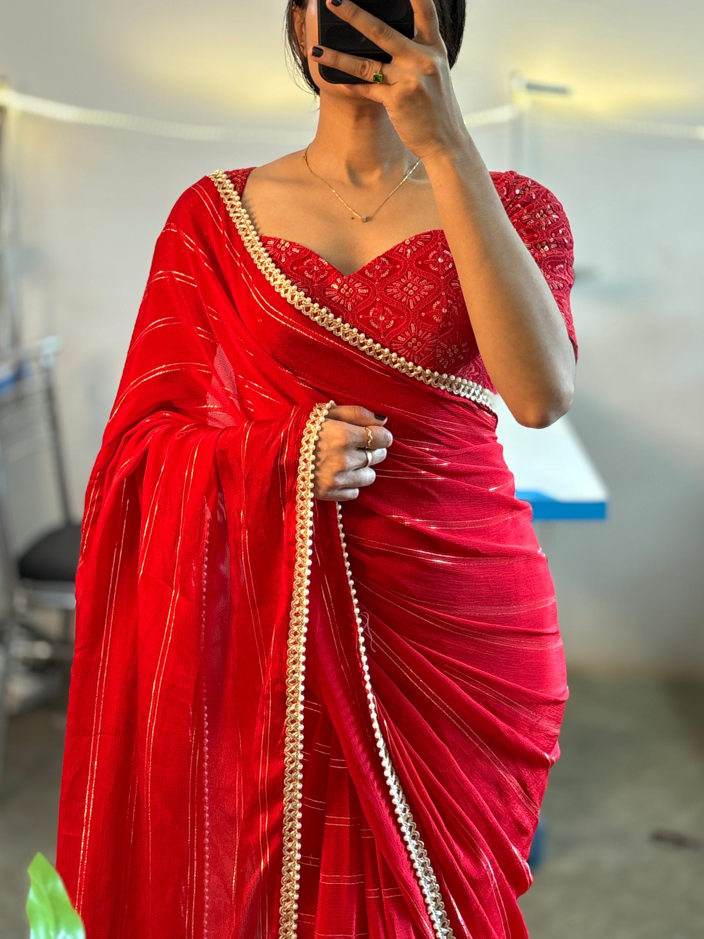 Red predraped saree with beaded border