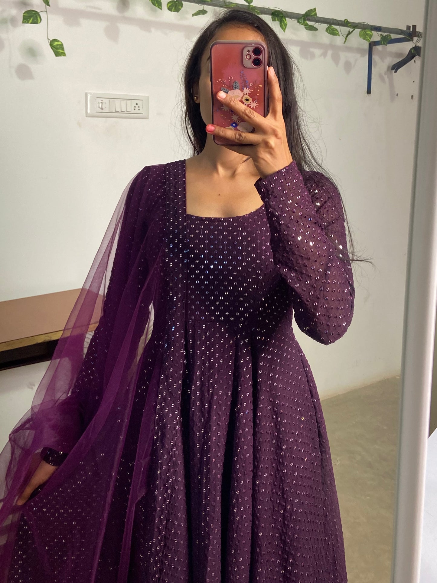 Plum shimmery Anarkali set.