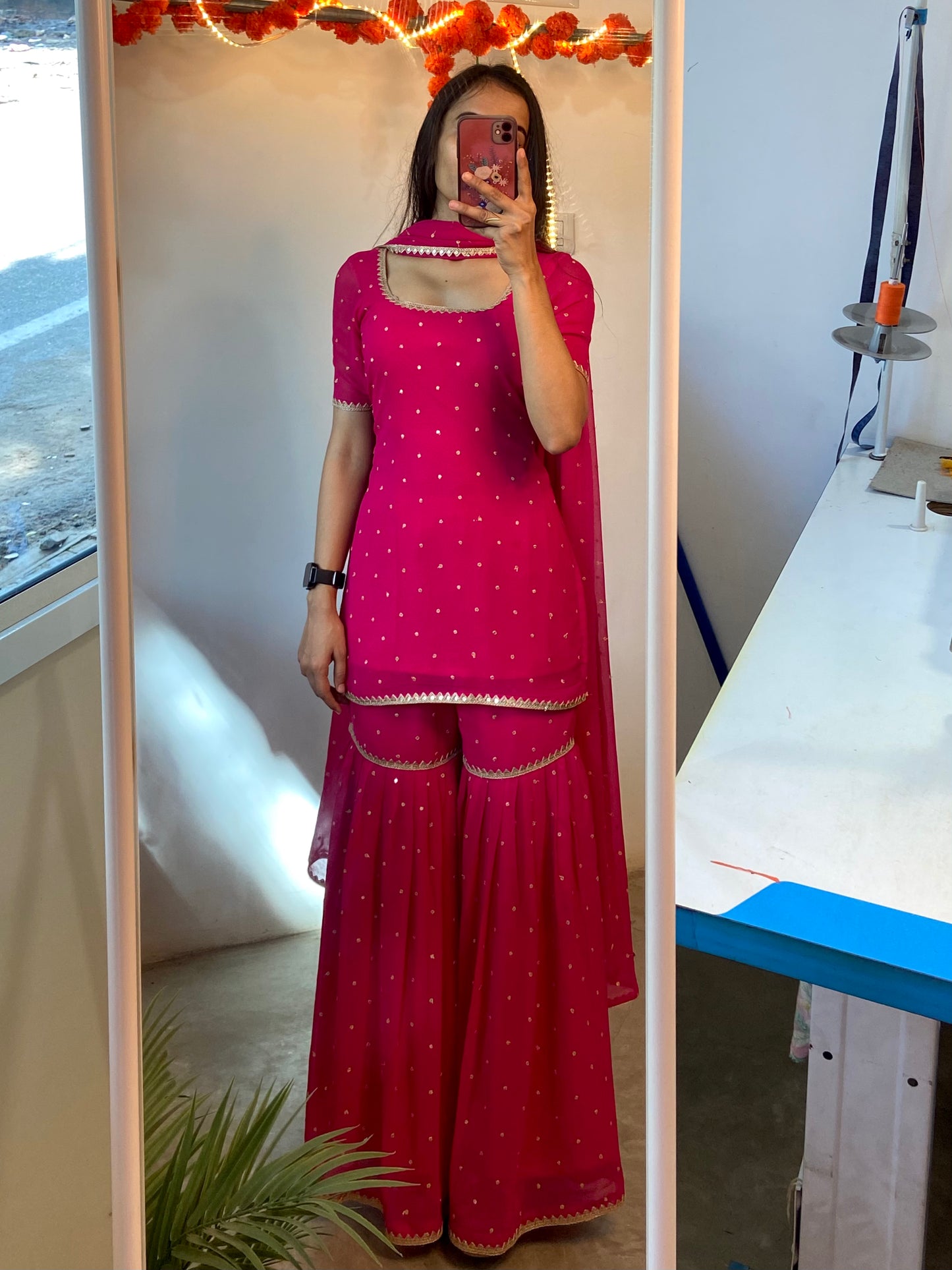 Rani pink sharara suit set.