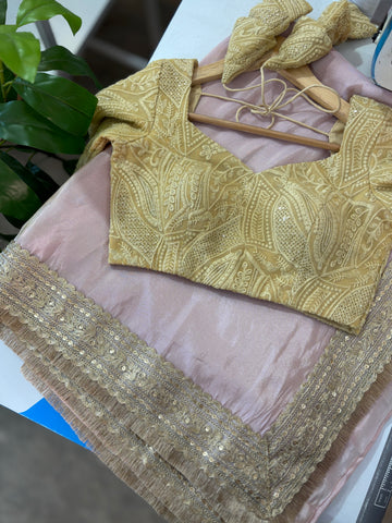 Baby pink tissue pre-draped saree with golden borders