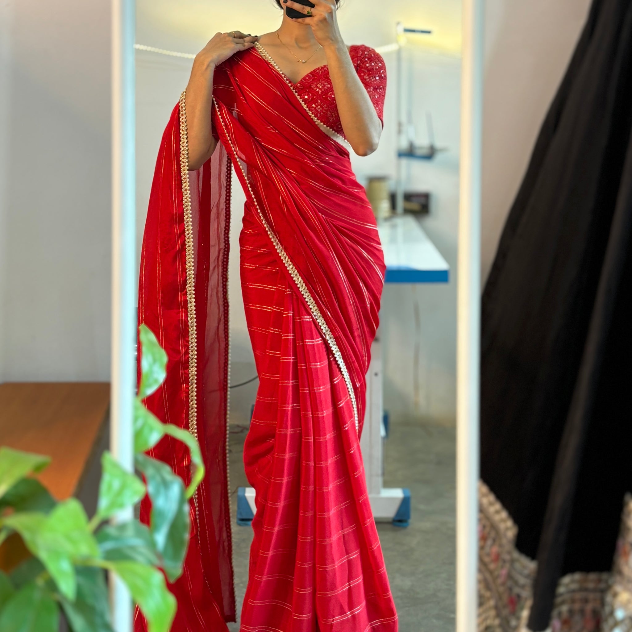 Red predraped saree with beaded border