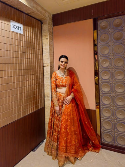 Rust orange Banarasi lehenga set