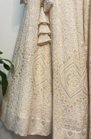 Off white heavy embroidered lehenga set