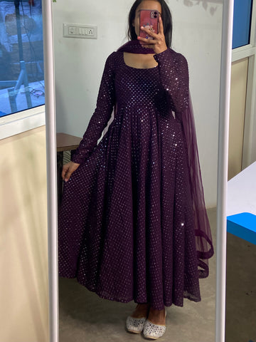 Plum shimmery Anarkali set.